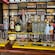 A table with different rum bottles, glasses and cocktail making equipment at a traditional rum shop in Saint John’s